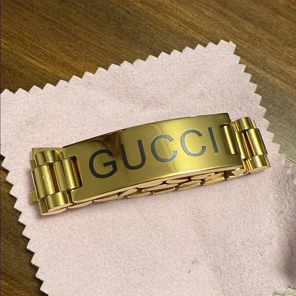 Gucci Gold Men's Bracelet with Black Lettering